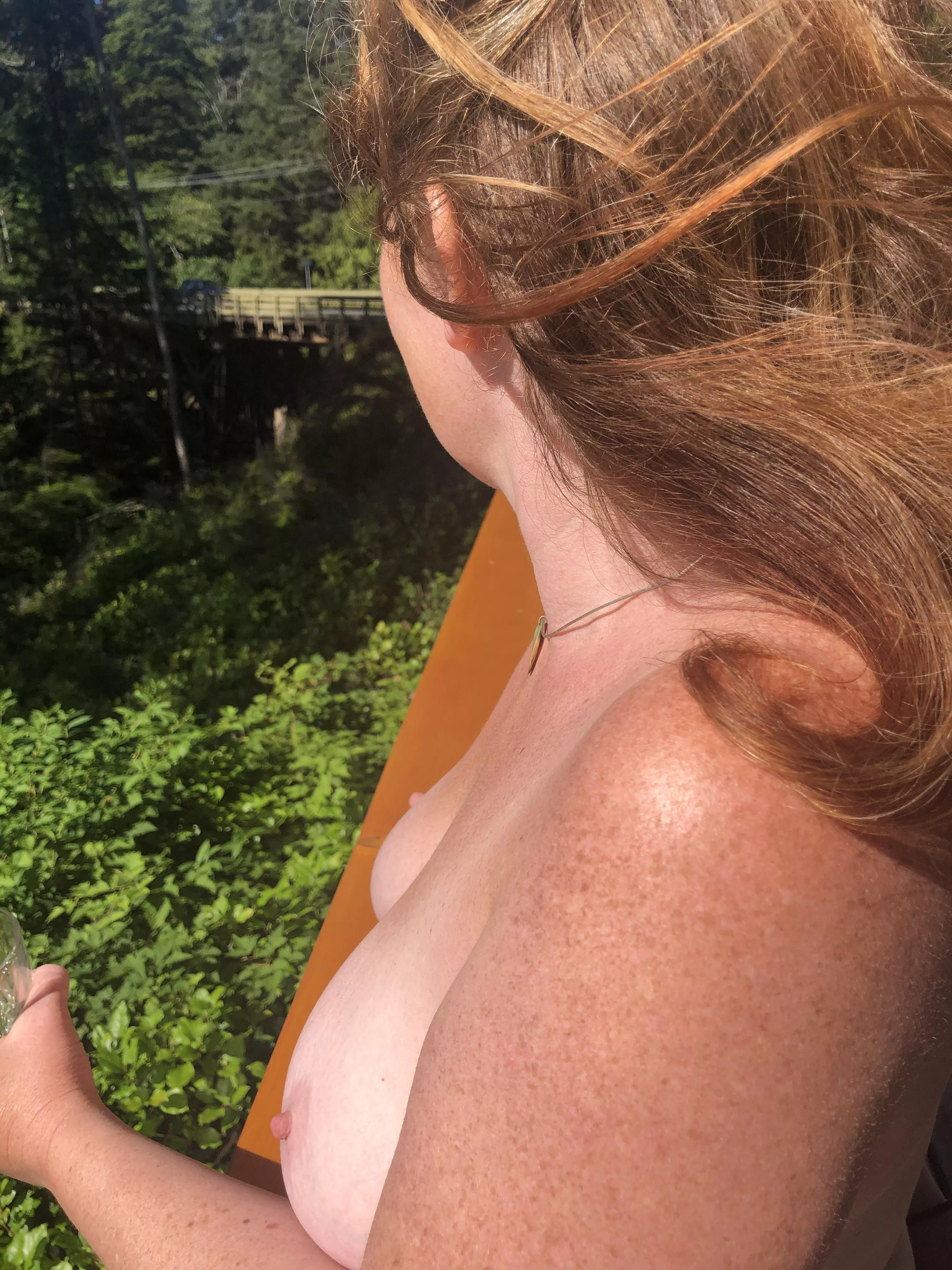 Natural Ginger, freckled golden in the sun.