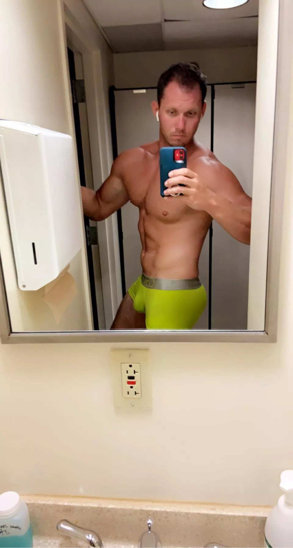 Neon green calvins in the locker room post lift 😈