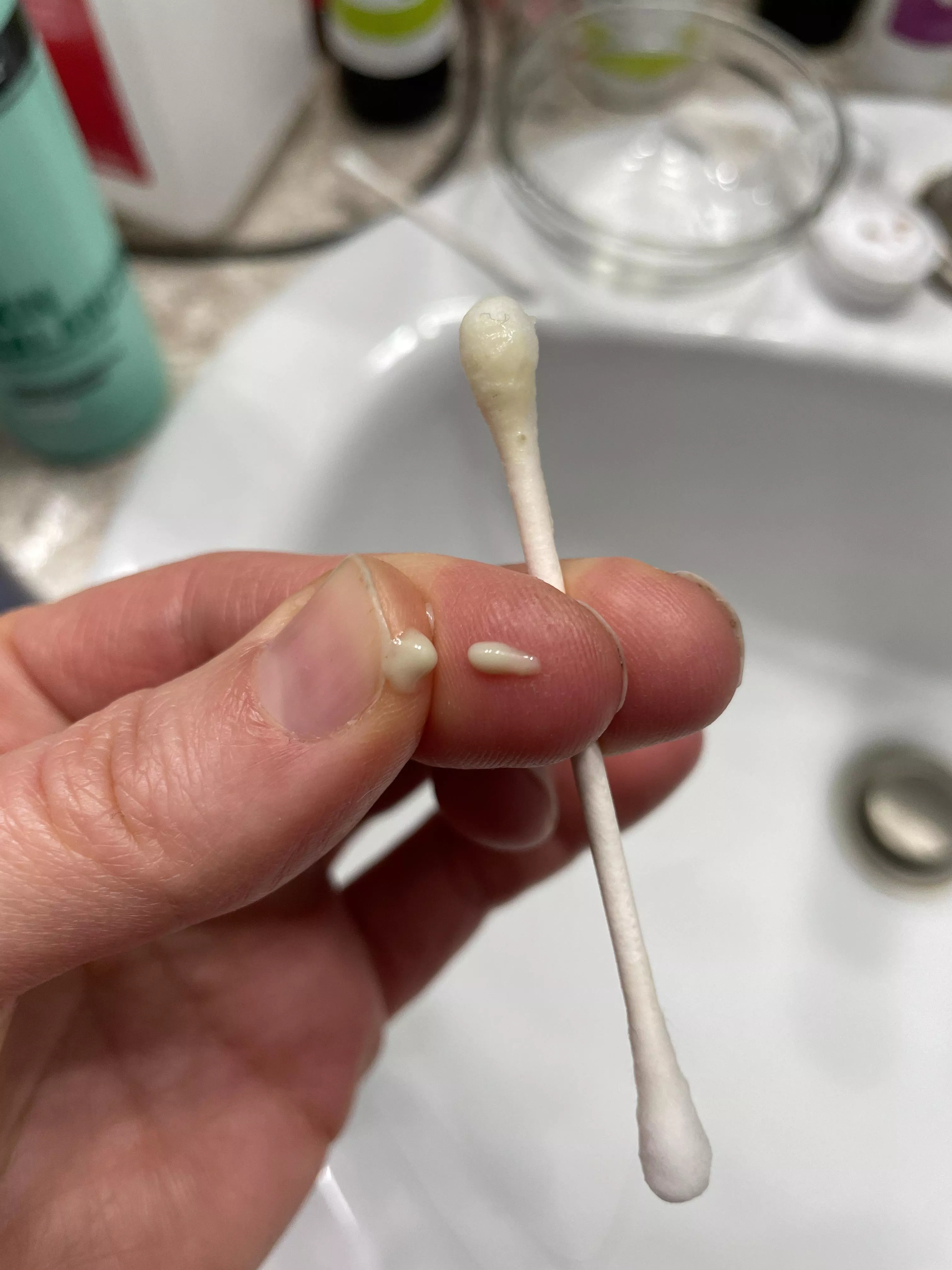 New piercing infection... I was cleaning the earring and trying to relieve some of the itching by pulling on the lobe away from the piercing and this is what I accidently let out...