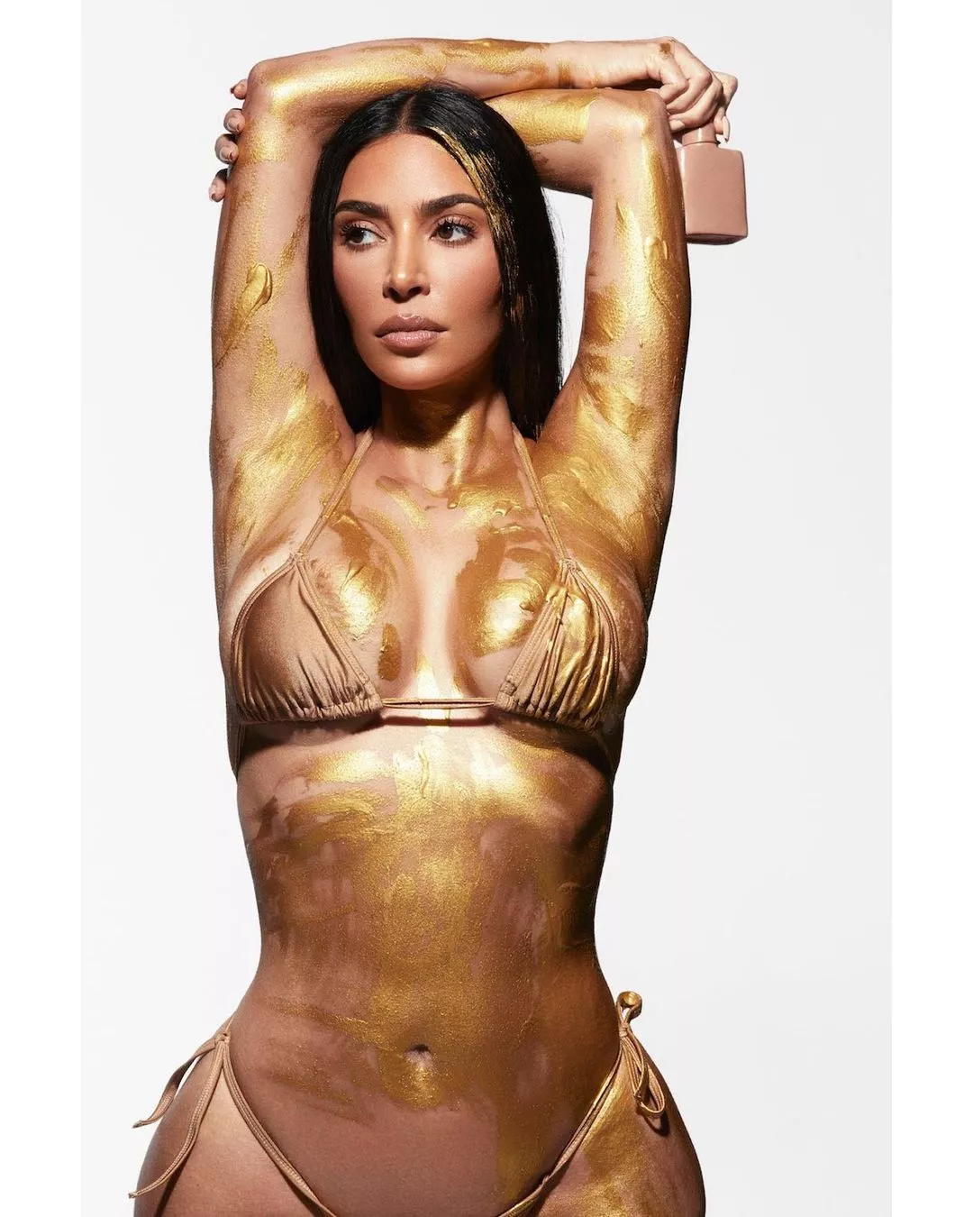 Newest gold body paint image