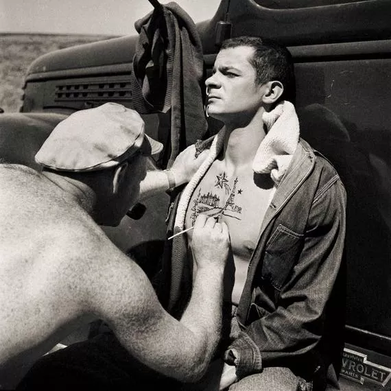 Not sure what's going on here, but having Popeye the Sailor Man tattoo me would be foreplay. Early 60s??