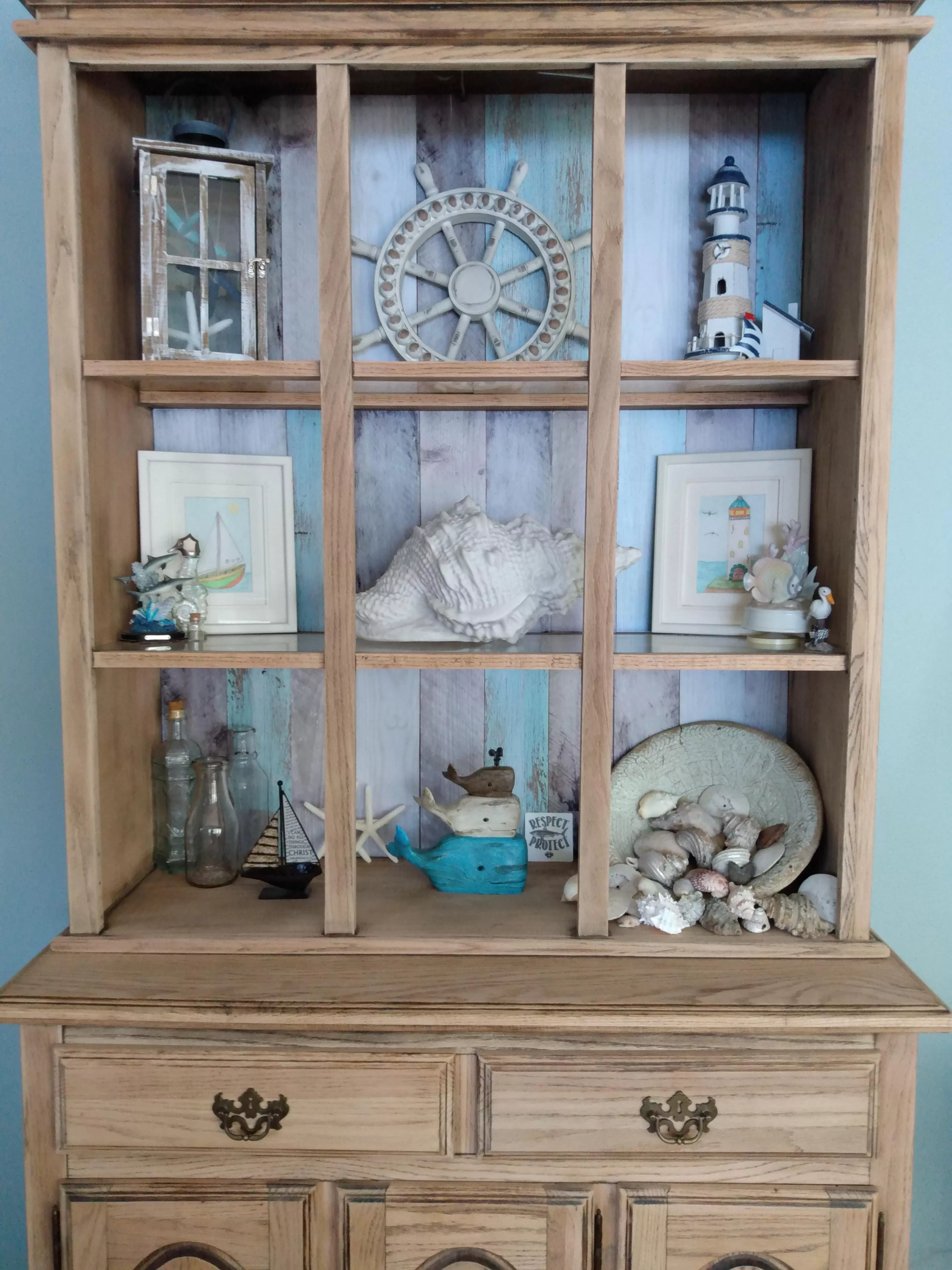 Our beach-themed hutch is coming along great!