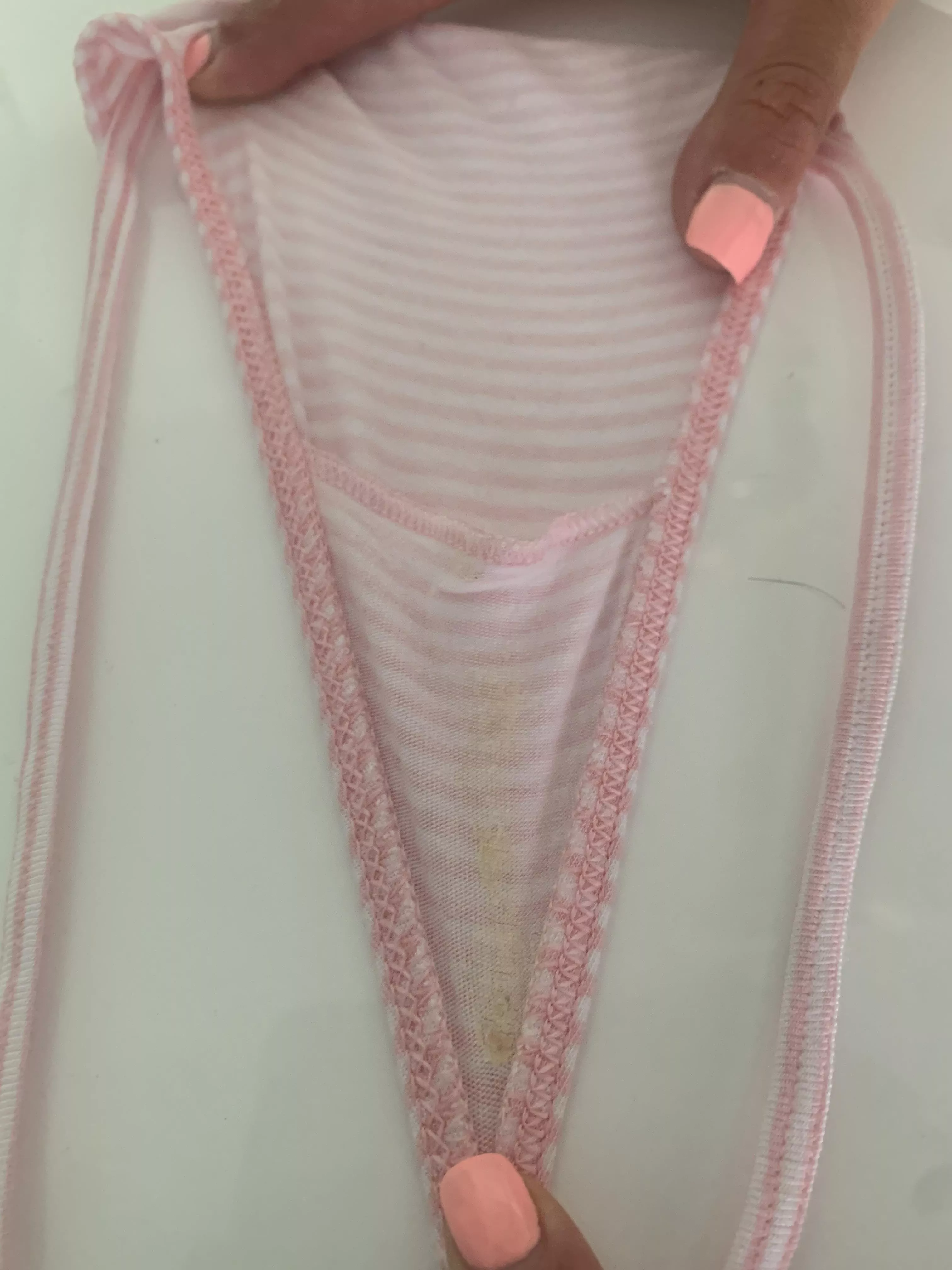 pink and white striped g-string. Crusty and cummy and ready for more ðŸ˜‰