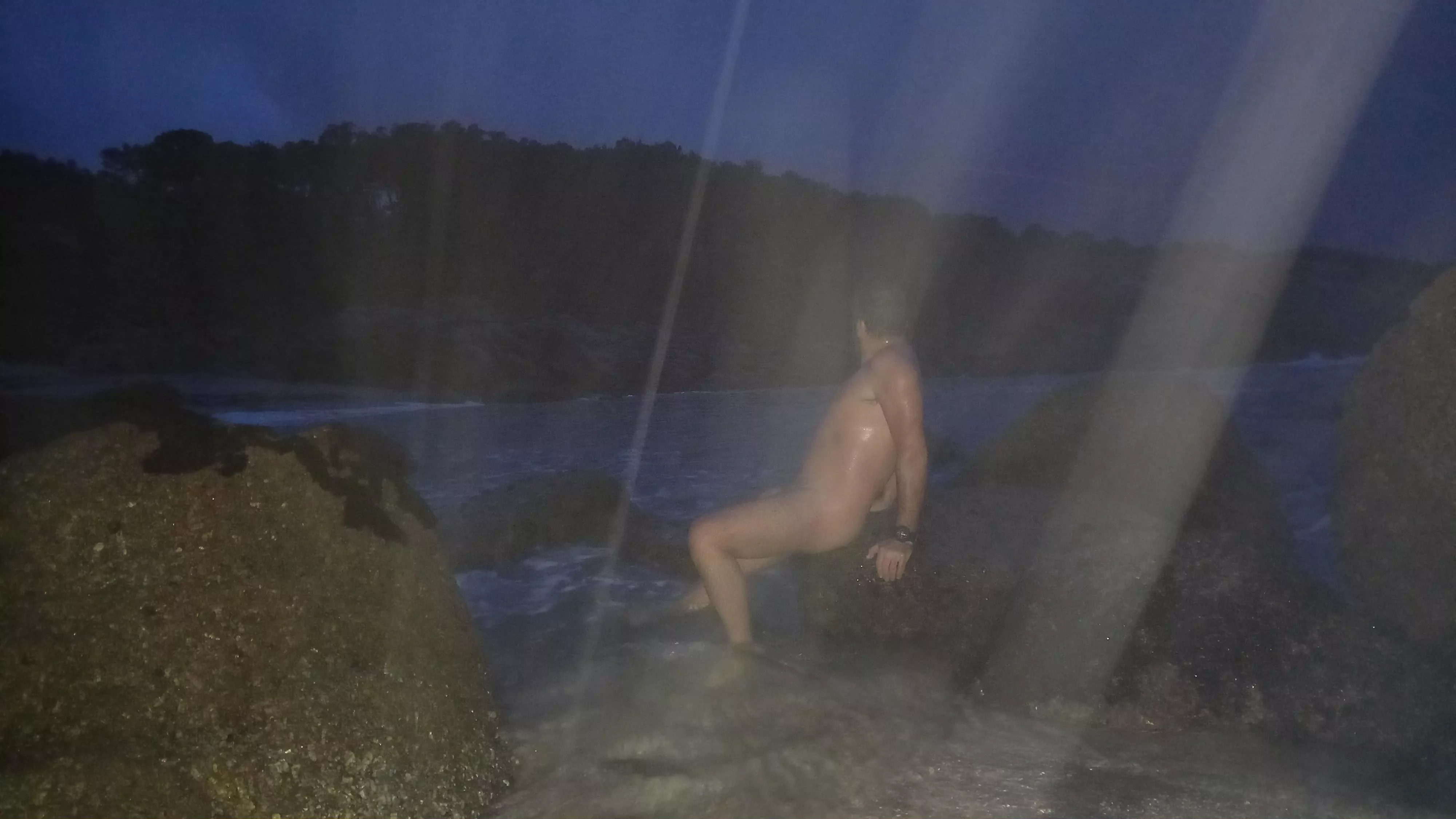 Raining. Nude freedom, night and beach.