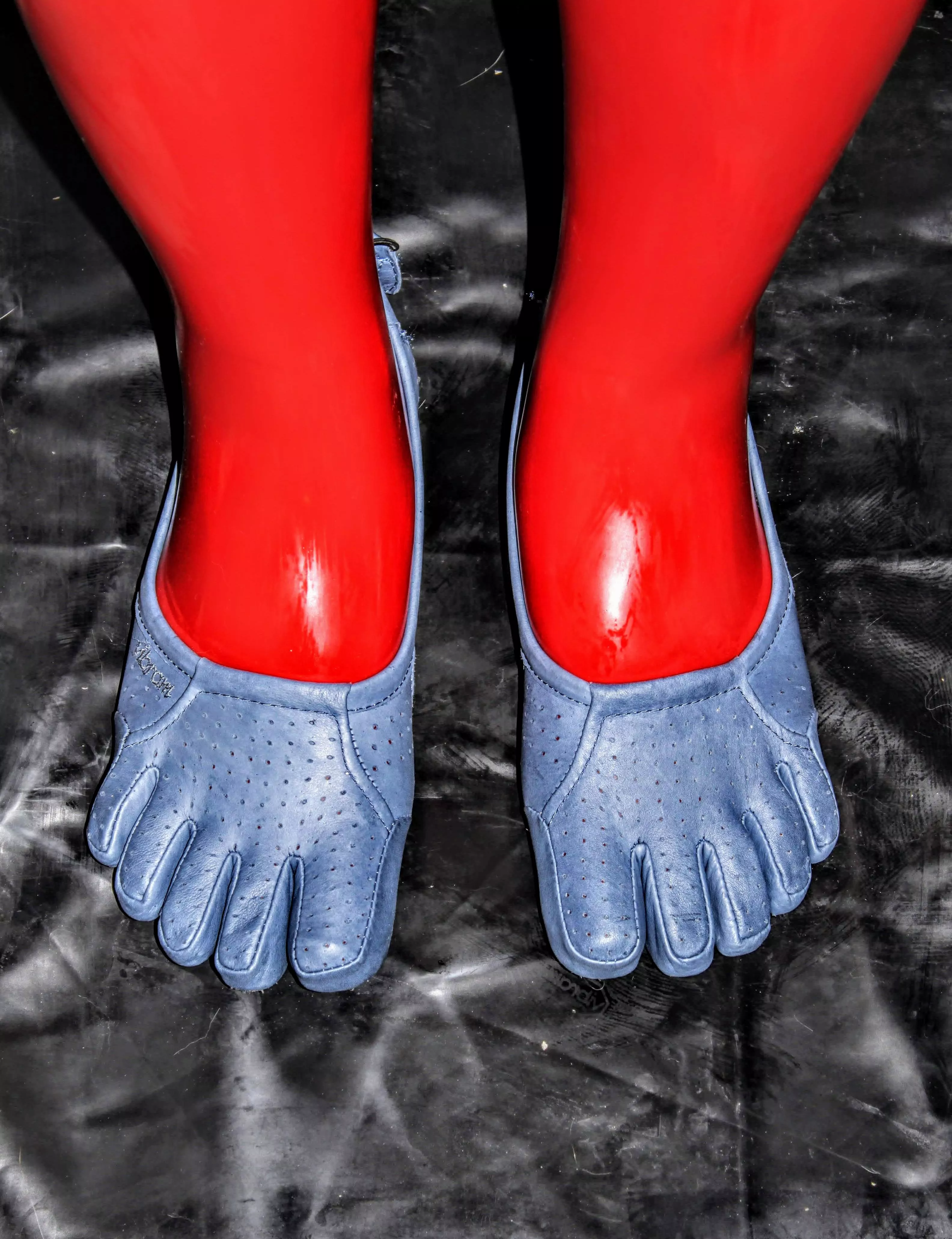 Red latex toe socks and blue Vibram FiveFingers