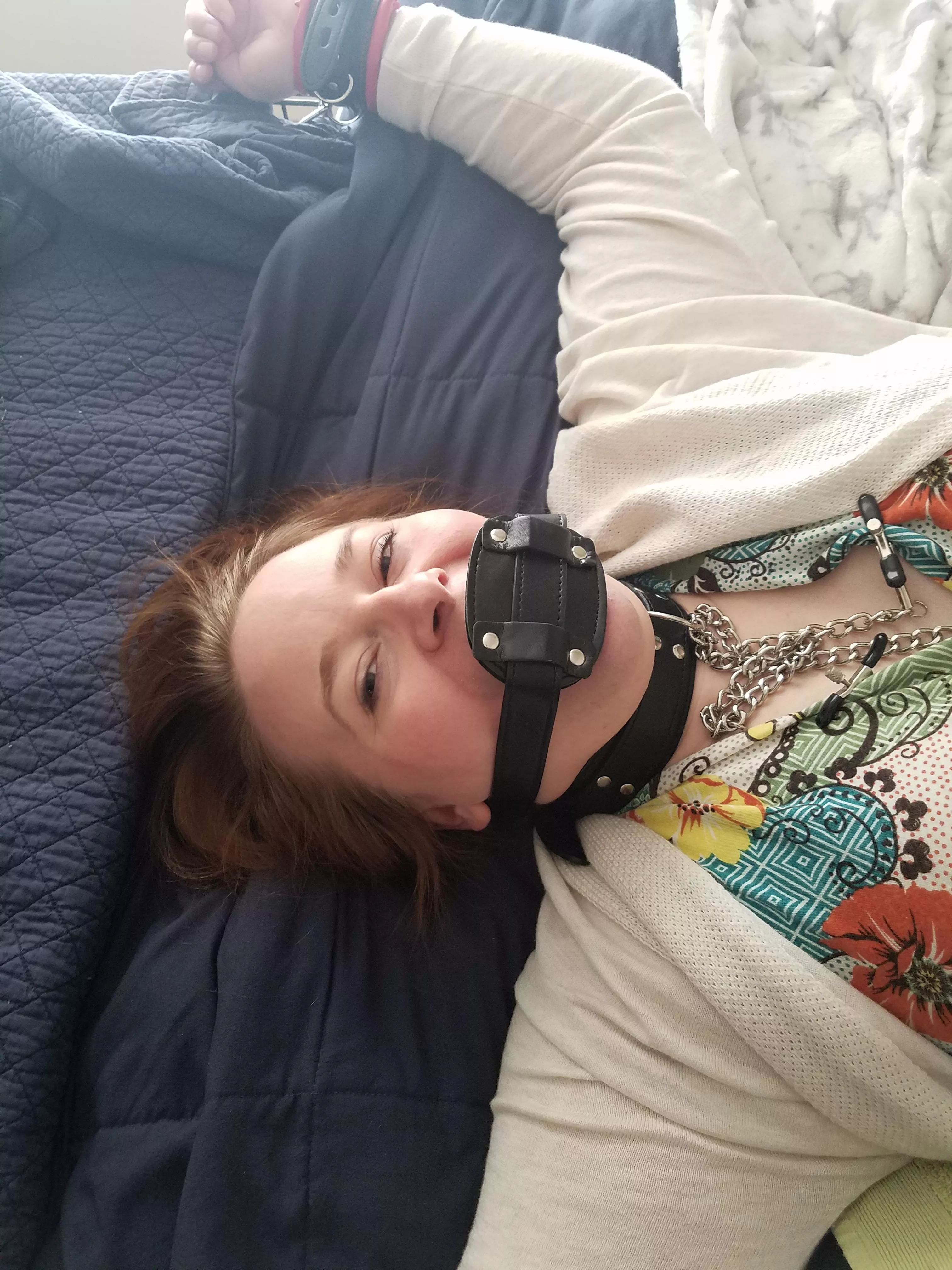 Relaxing with a penis gag