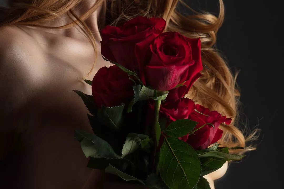 Roses as a symbol of feminine sexuality and desire in erotic photography. Thoughts?