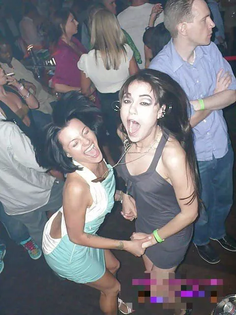 Sasha and Belladonna dancing happy in a club