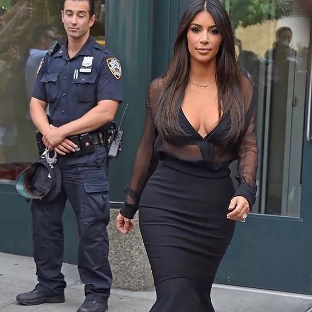 She's so hot even police officers get distracted by her presence!