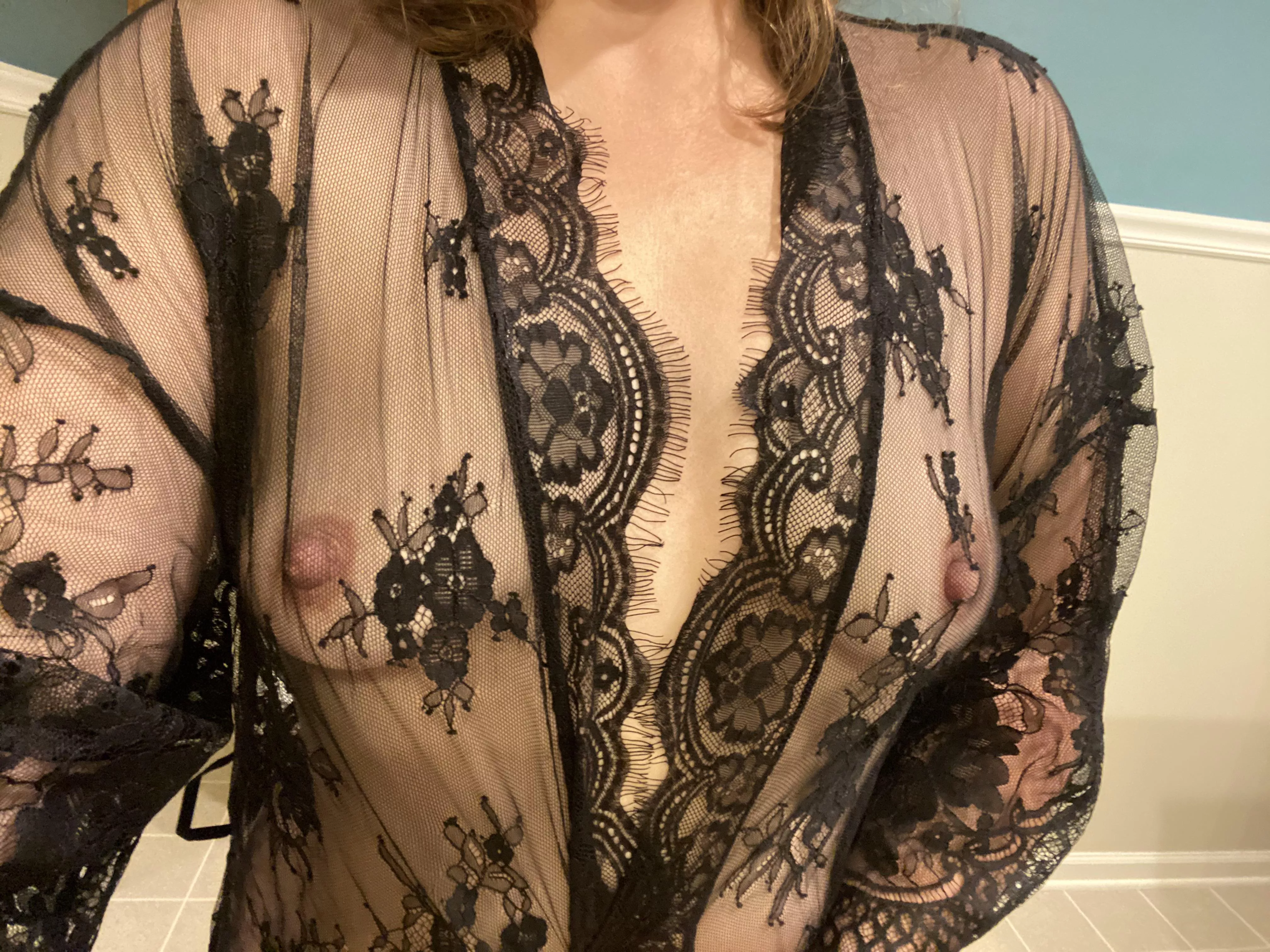 Slutty wife teasing those tits through the lace