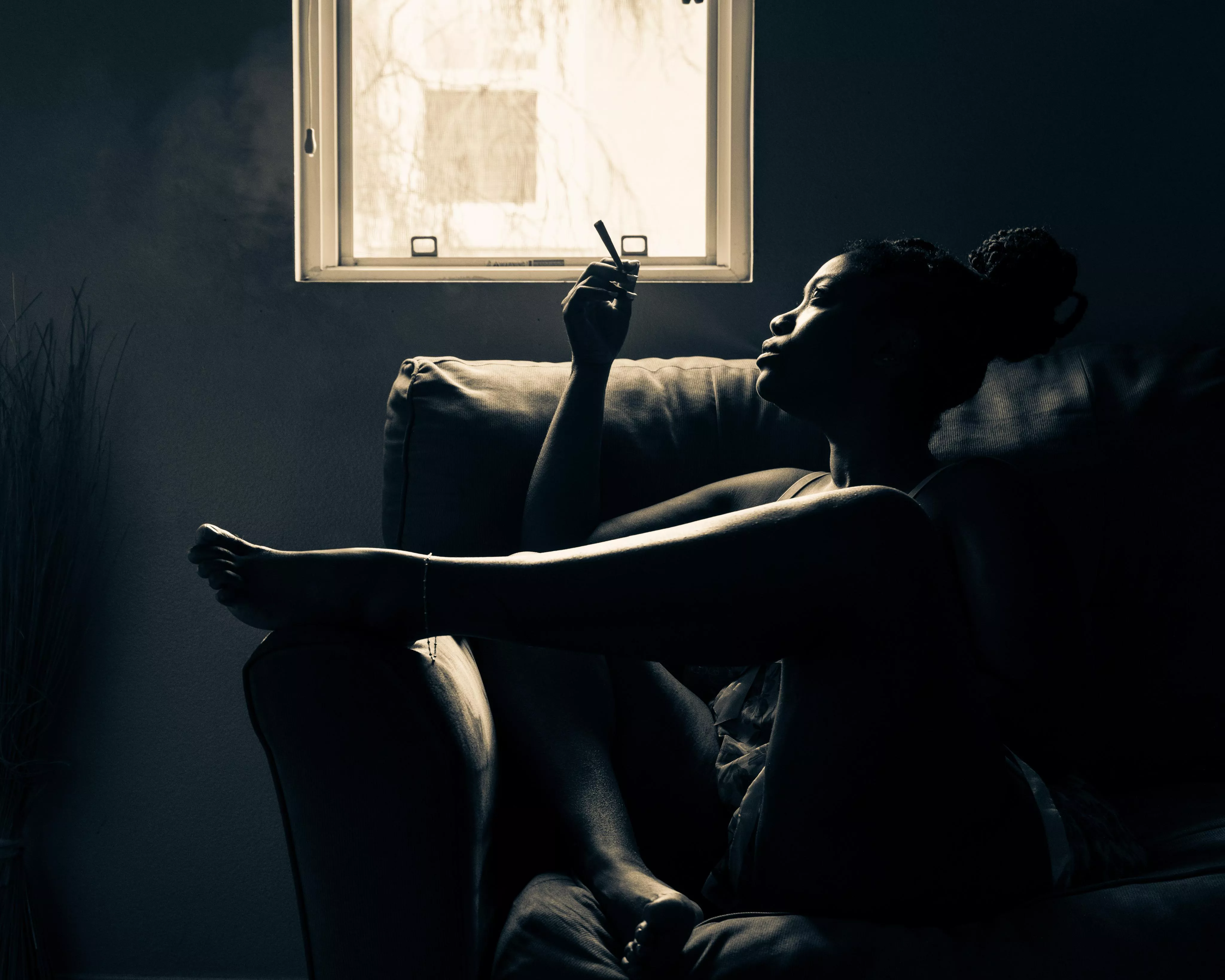 Smoking by the window