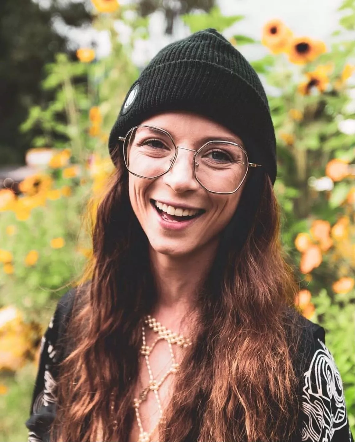 Surrounded by sunflowers and nothing but smiles