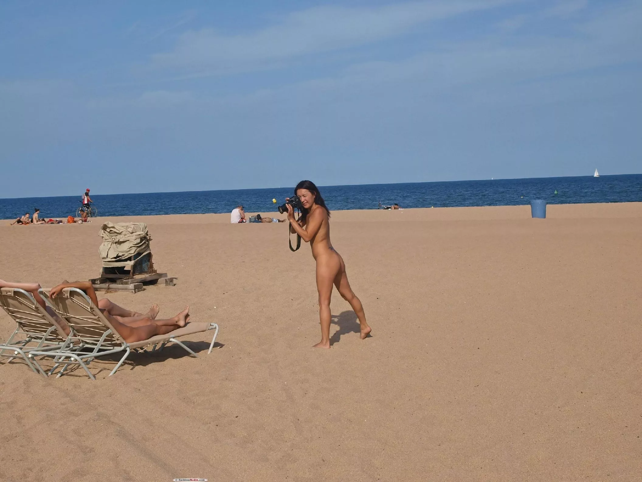 Taking photos of nude people on the beach