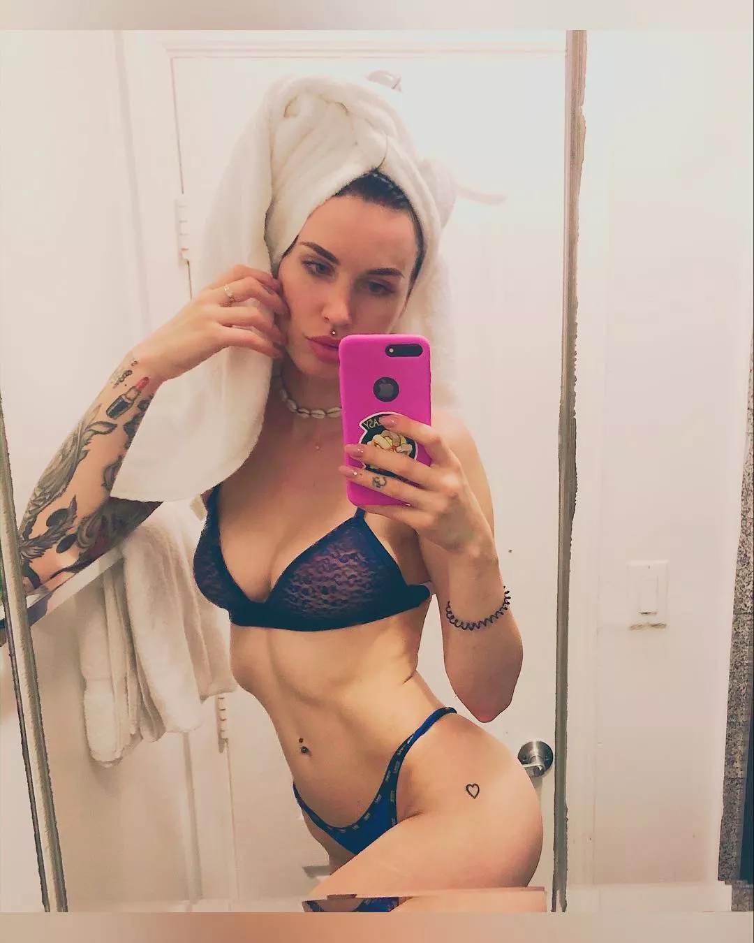 Tattooes and a towel