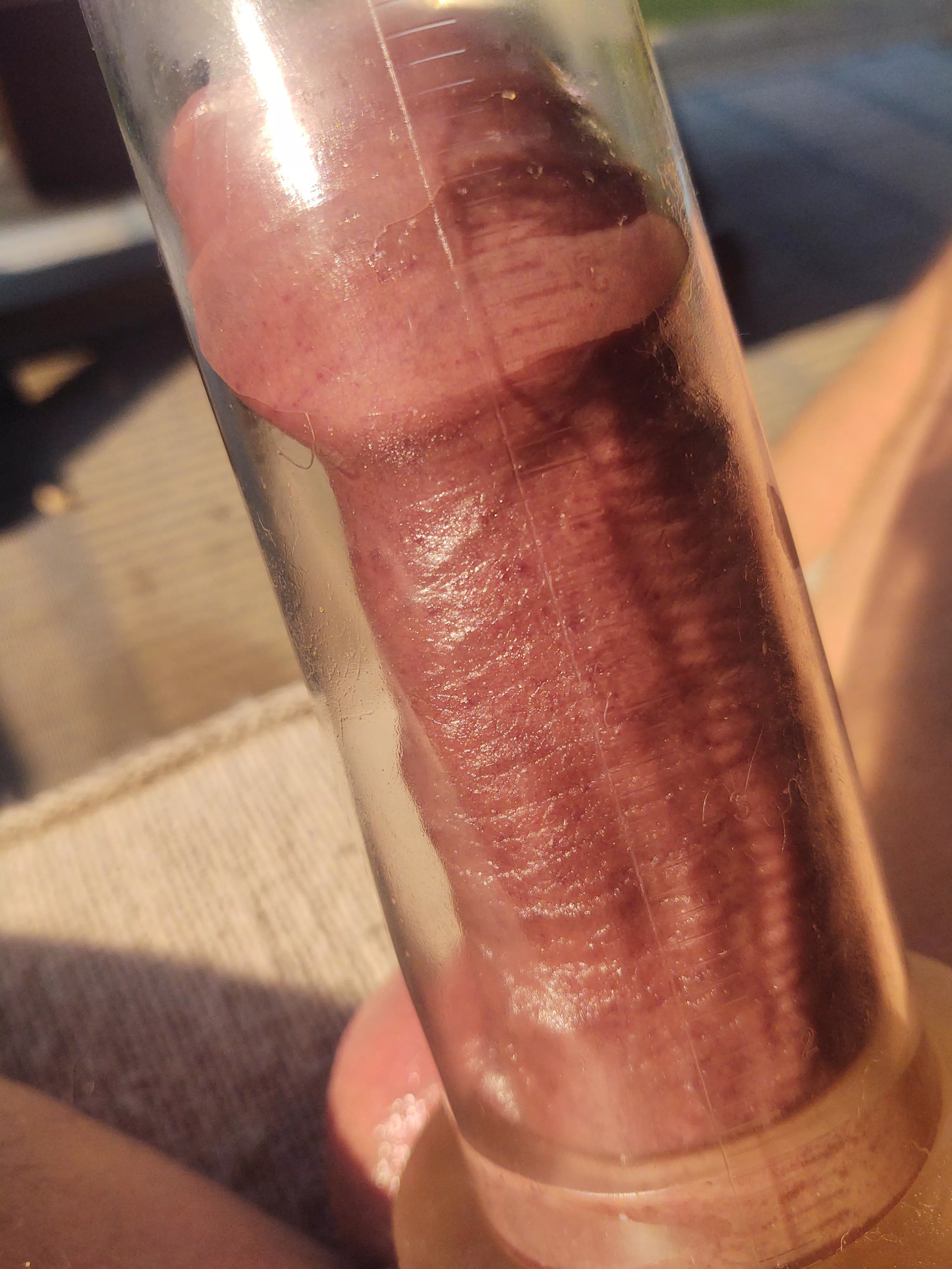 The sun feels so good beating down on my hard pumped cock.