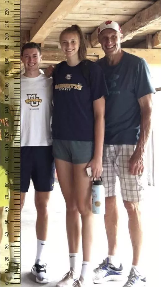 This guy is 6’4” and he is absolutely dwarfed by his 6’10” little sister and 7’0” father!