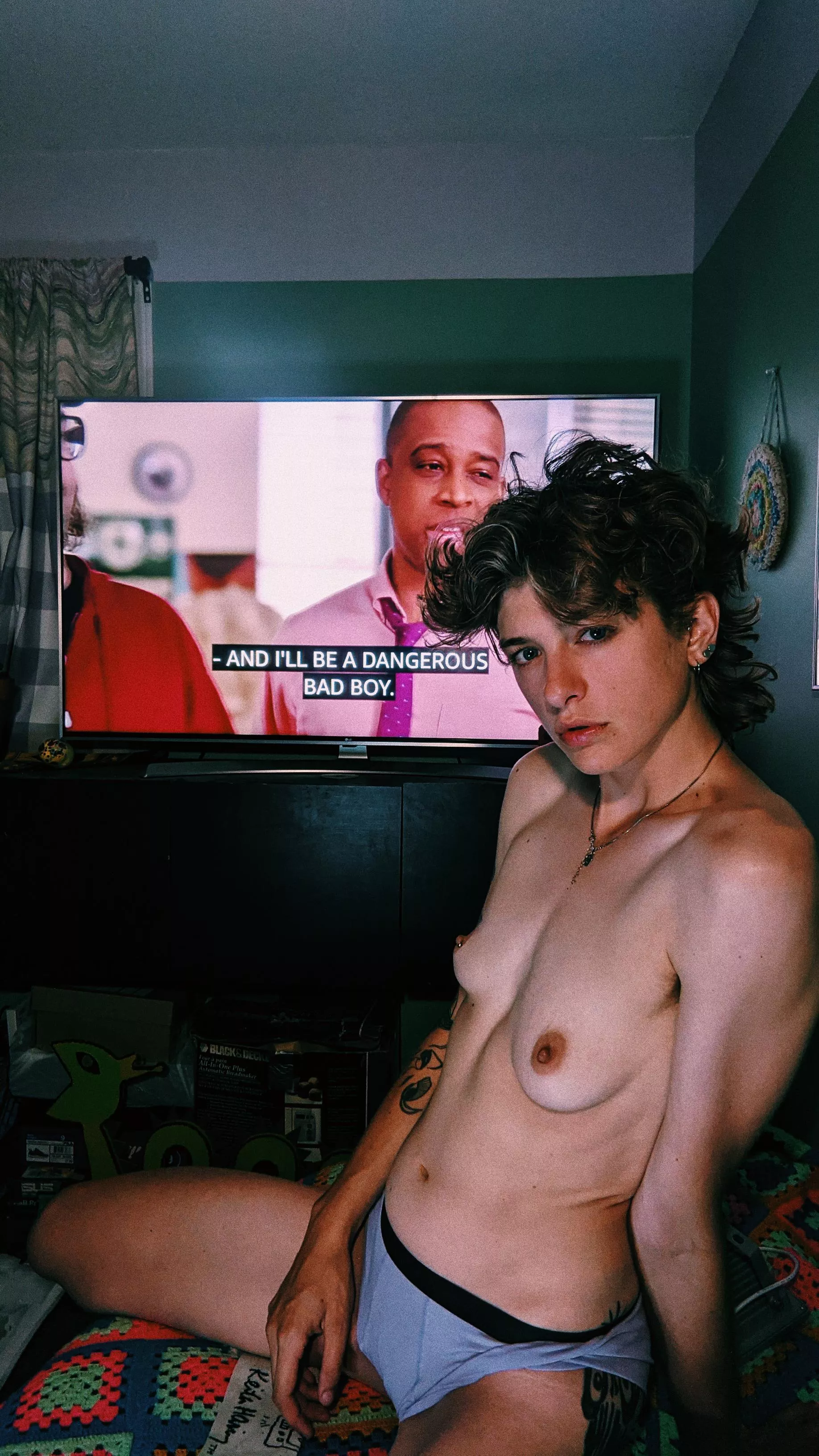 This photo is just missing my strap on...featuring perfectly timed captions on the tv 😅