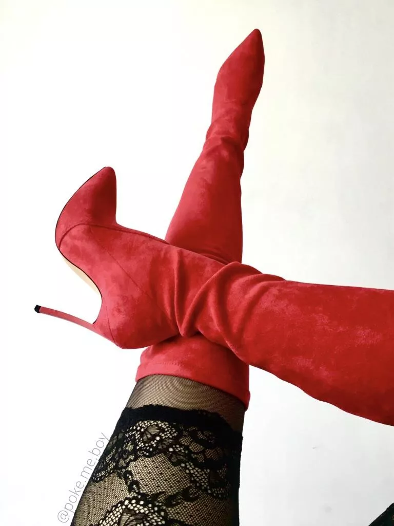 Those black stockings and red boots will drive you crazy