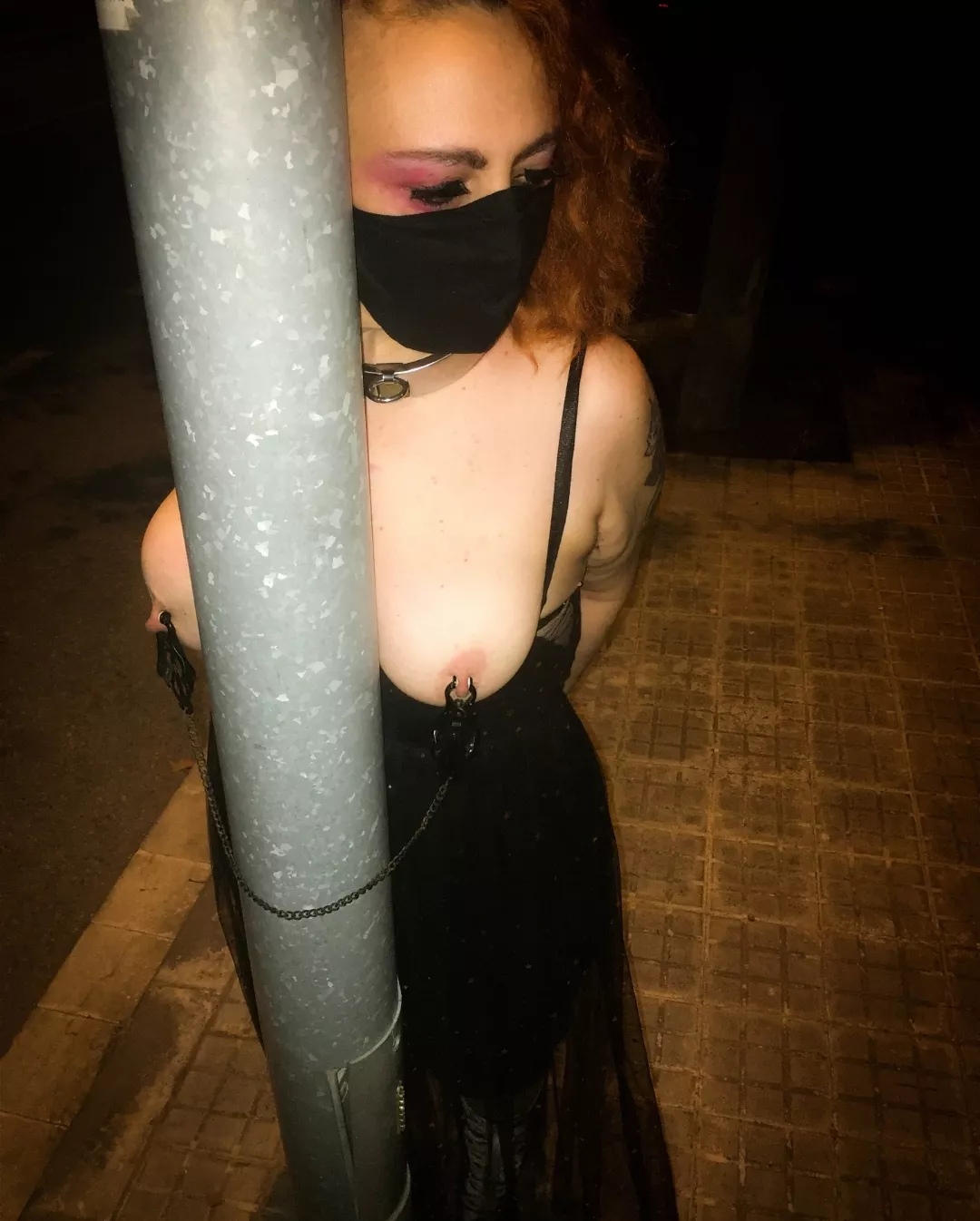 Throwback time. My nipple clamps around the streetlight pole, exposed and ready to be used.