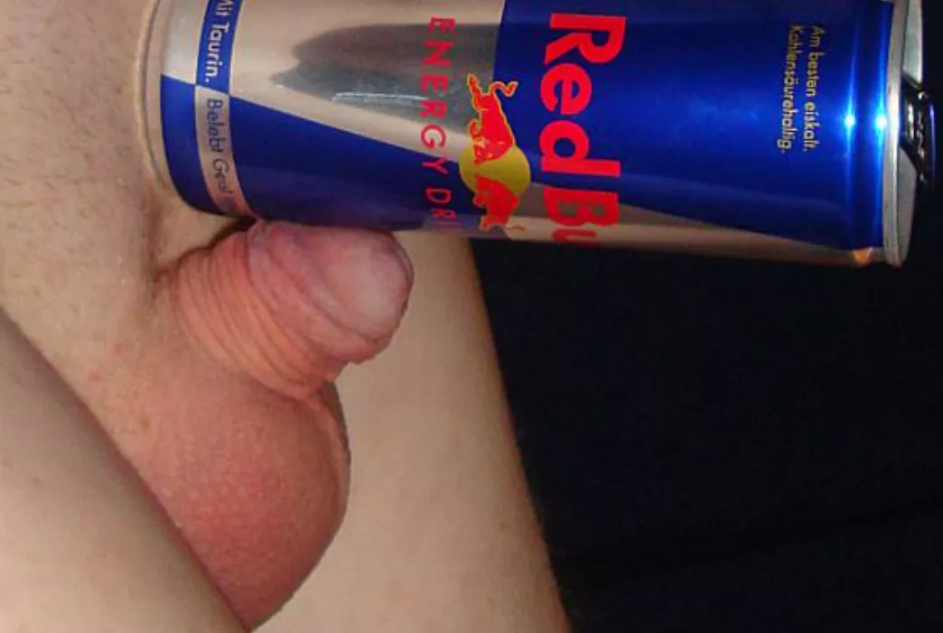 Tiny penis halfway hard compared to little Red Bull can...