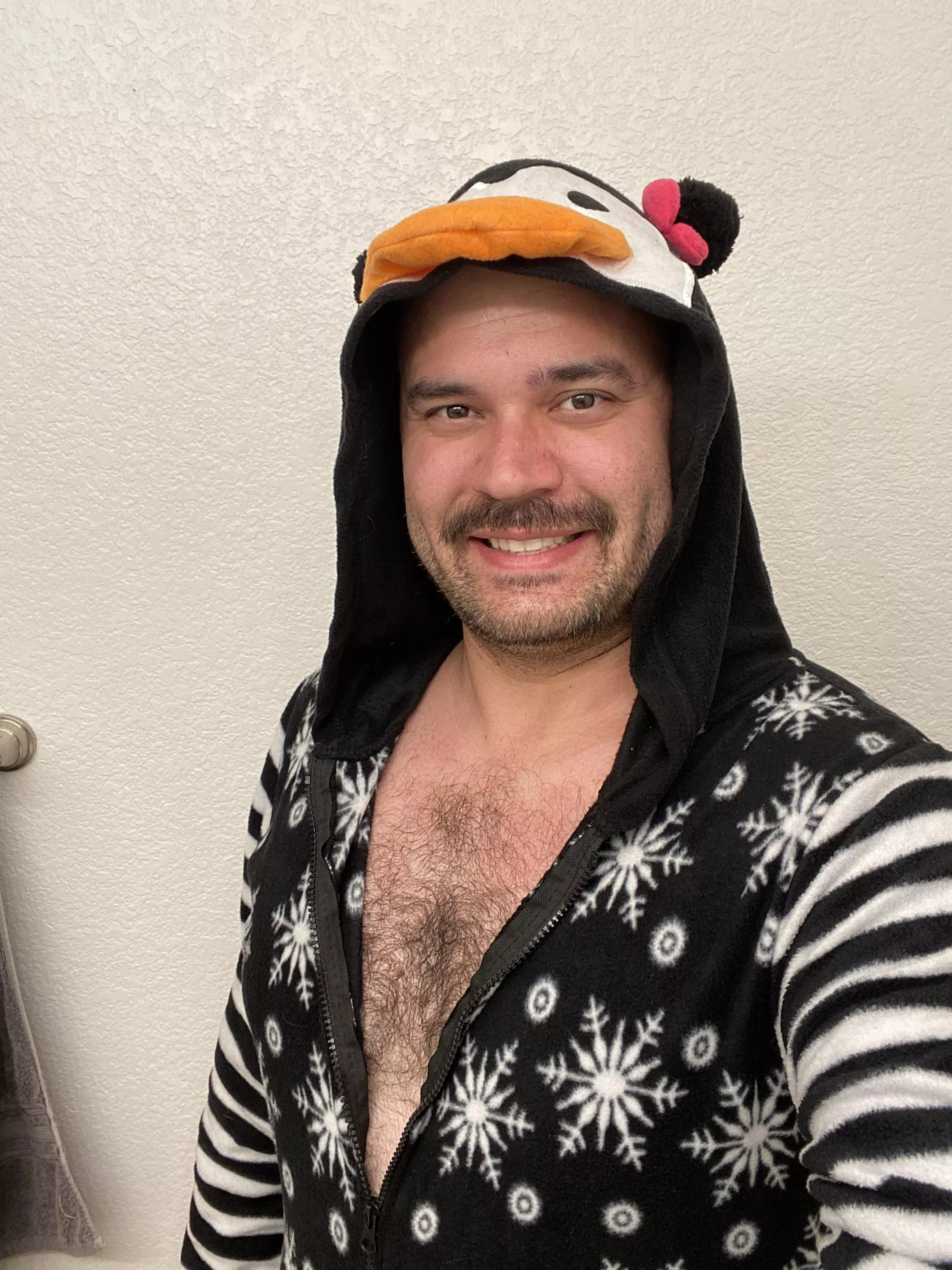 Today was holiday dress up day at work. So I put on my holiday penguin outfit. Showing off the chest here for the guys. 😉