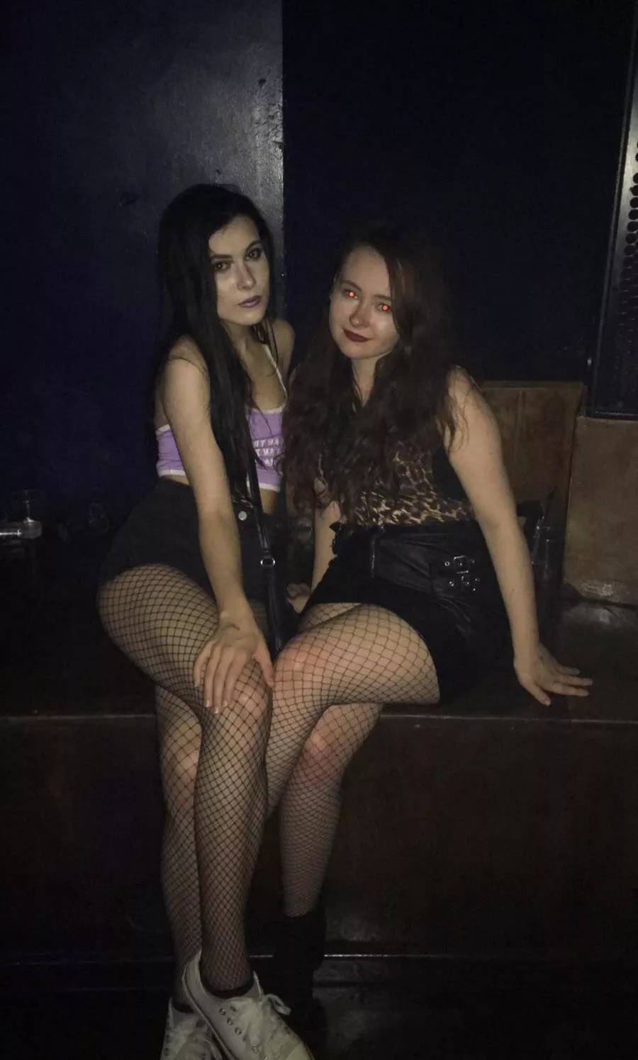 Two fishnet cutie ravers, whose side are you on?