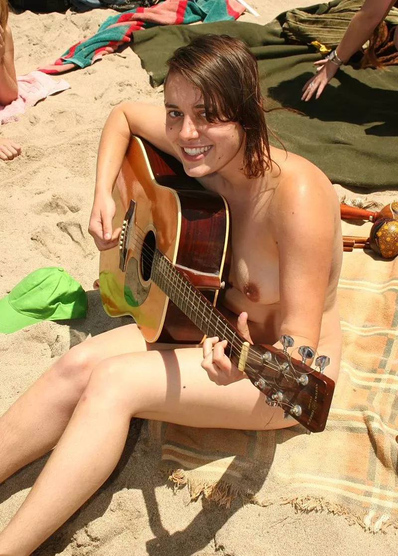 We love guitar players on the beach