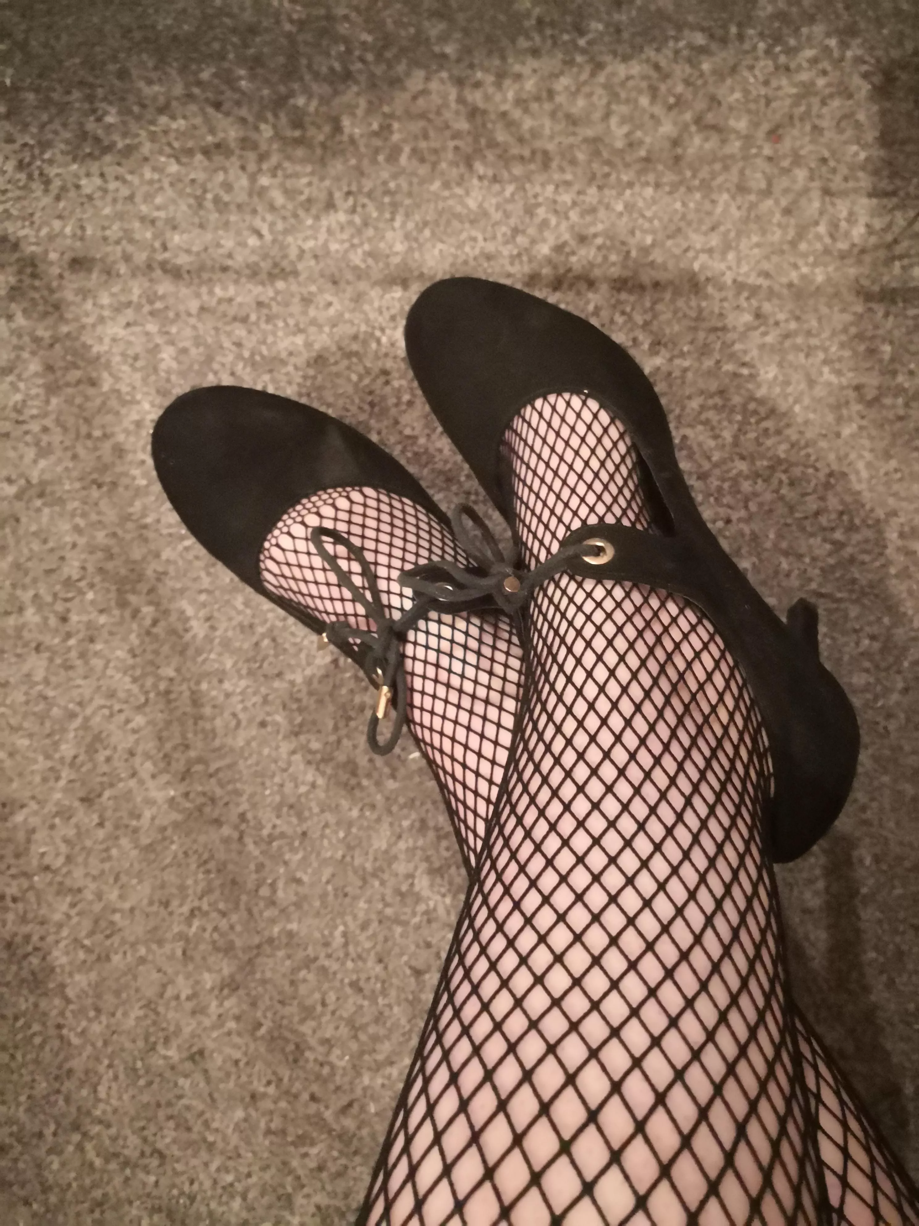 Who likes my black heels and fishnets?