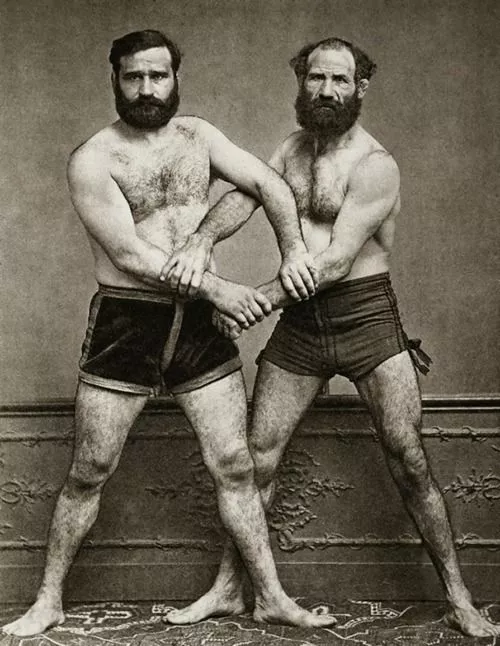 Wrestler bros from circa 1910s. Look at those legs!!