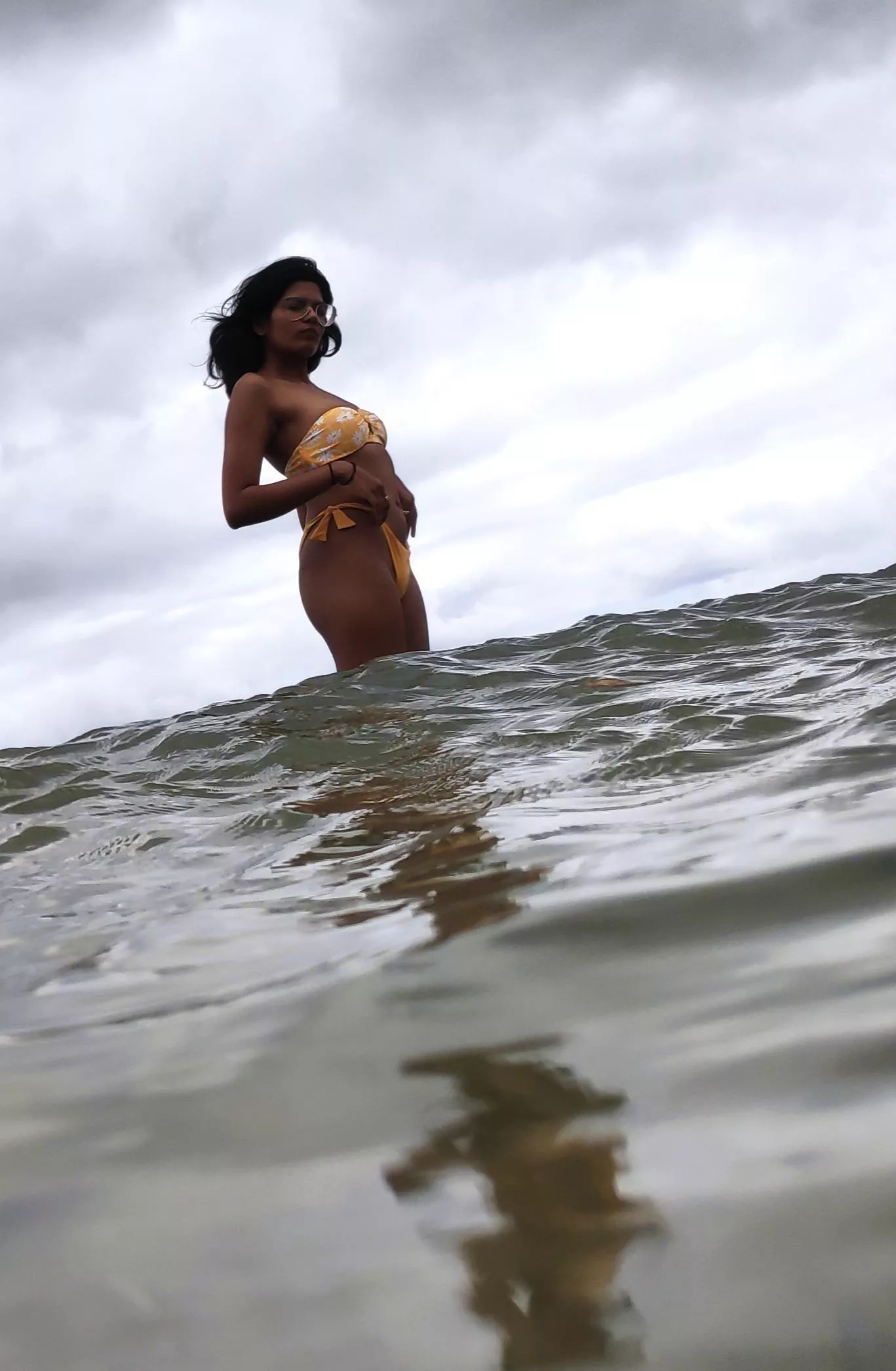 Yellow bikini and rough sea [f]