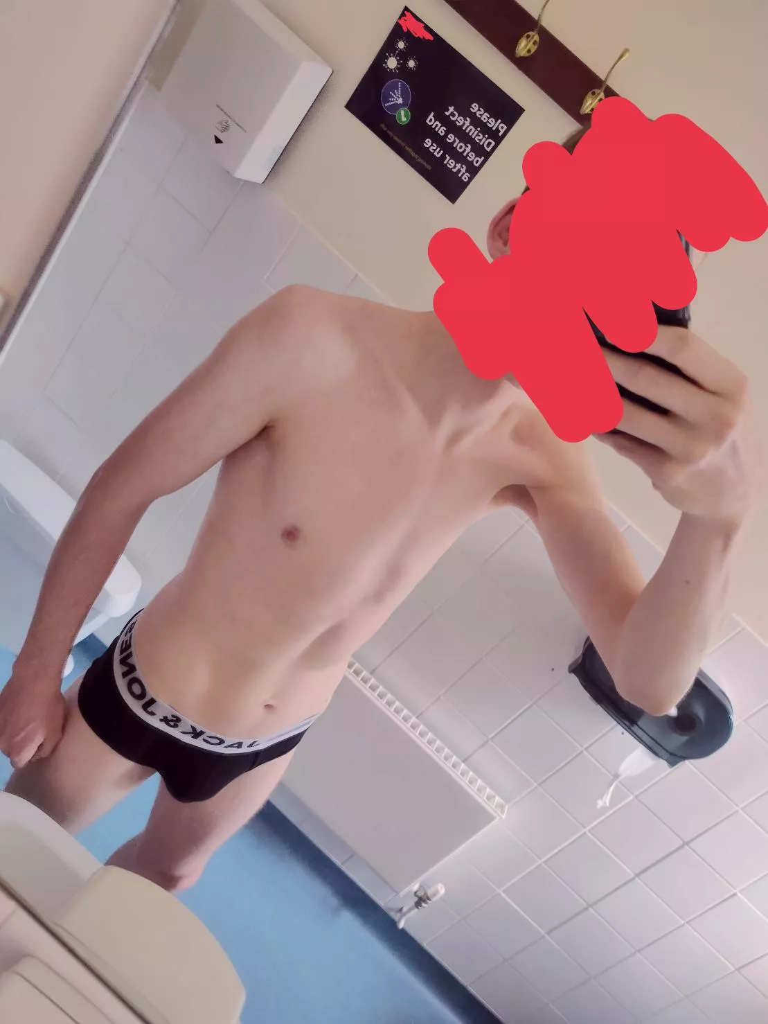 You walk into the shared dorm bathroom and find a twink stripped to his briefs, what do you do?